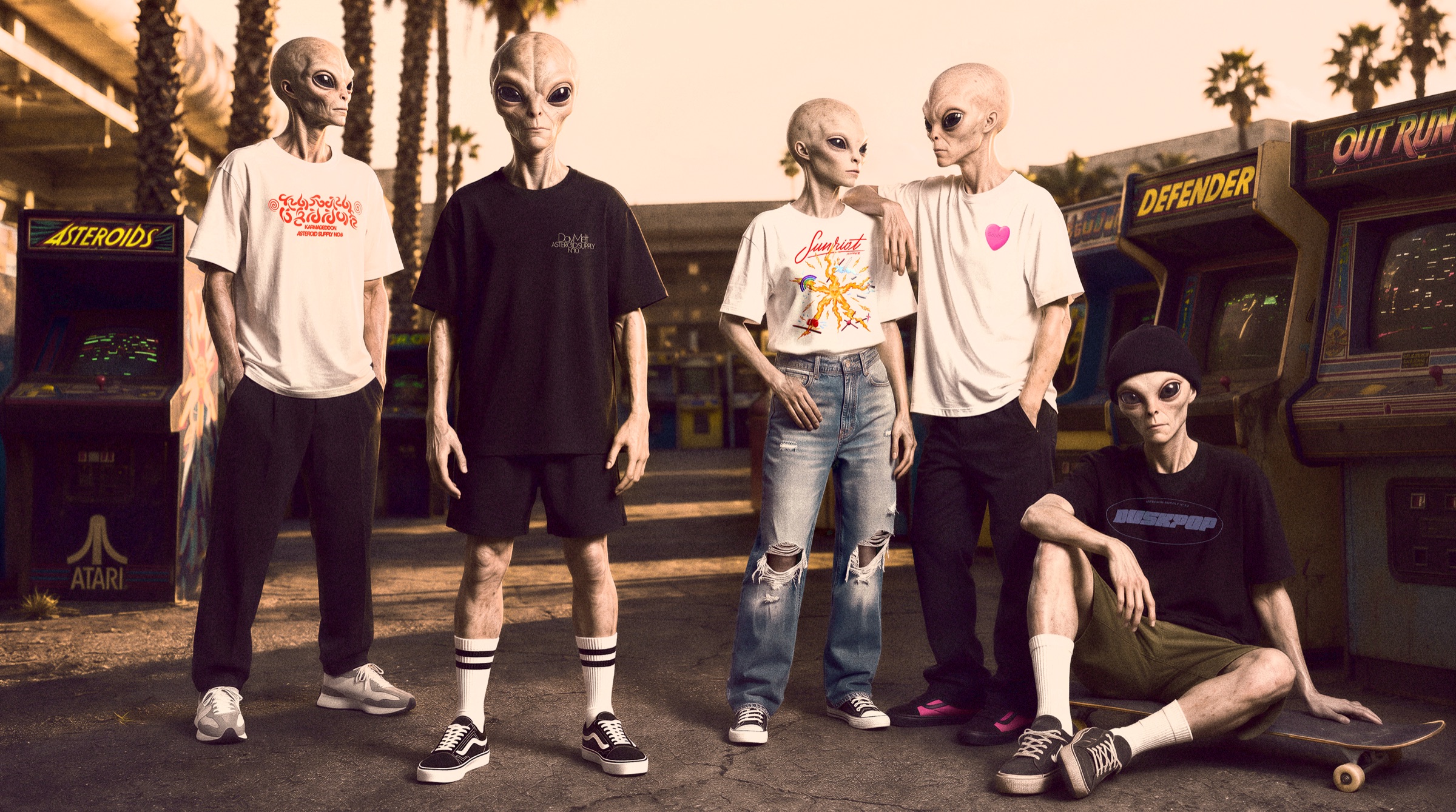 Alien models wearing Asteroids Supply beside arcade machines